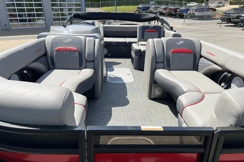 Slide: The Image of 2024 Barletta Corsa 23U pontoon boat interior with luxurious seating and modern design. - 26