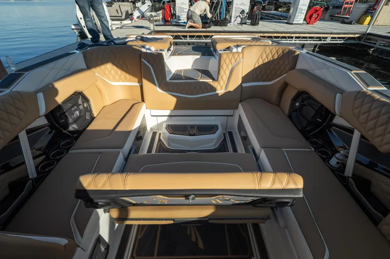Slide: The Image of 2026 Tigé 24RZX boat interior with luxurious tan seating and modern design. - 17