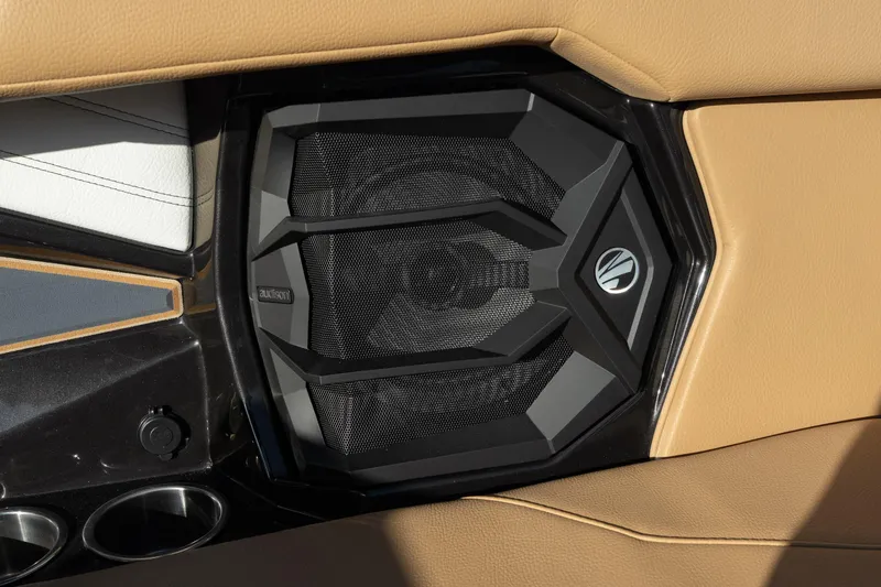 Slide: The Image of 2026 Tigé 24RZX boat interior with premium speaker system and beige upholstery. - 18