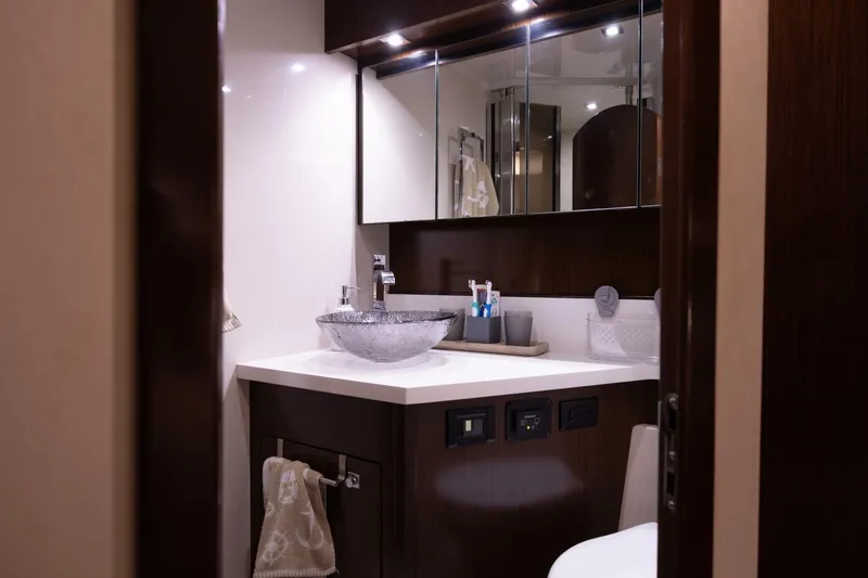 Slide: The Image of Luxurious bathroom in 2013 Cruisers Yachts 540 Sports Coupe with modern fixtures and elegant design. - 14