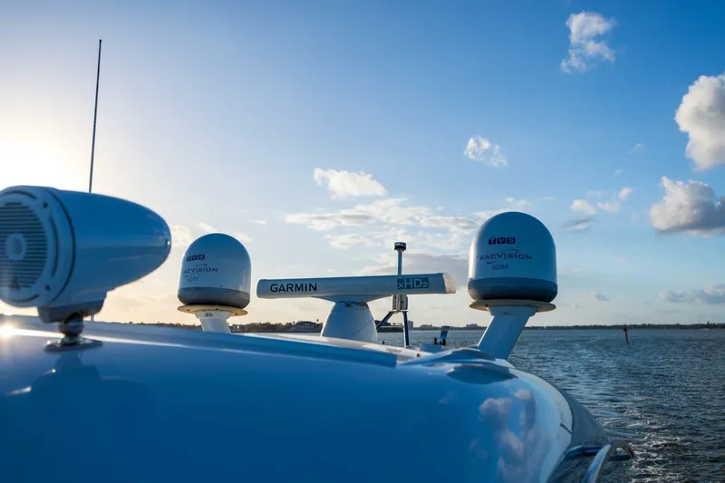 Slide: The Image of 2013 Cruisers Yachts 540 Sports Coupe with Garmin radar on open water. - 42