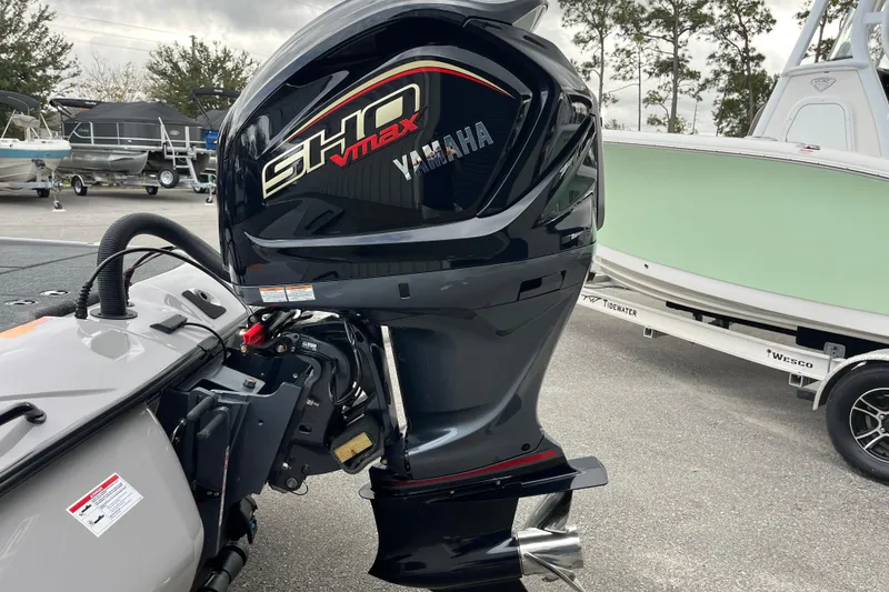 Slide: The Image of 2026 Skeeter ZXR21 SE with Yamaha SHO VMAX outboard motor. - 13