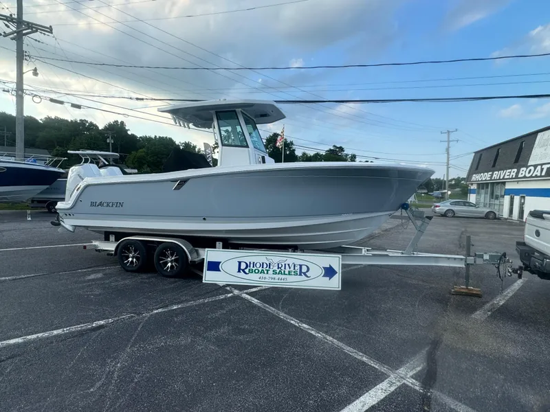 Slide: The Image of 2026 Blackfin 252 CC boat on trailer at Rhode River Boat Sales. - 1