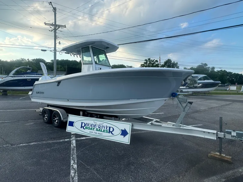 Slide: The Image of 2026 Blackfin 252 CC boat on trailer at Rhode River Boat Sales. - 2