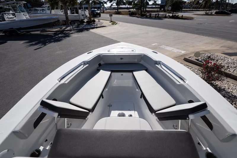 Slide: The Image of 2026 Sea Pro 202 Center Console boat interior with seating and console view. - 14