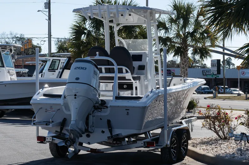 Slide: The Image of 2026 Sea Pro 202 Center Console boat with 200 HP engine on trailer. - 6