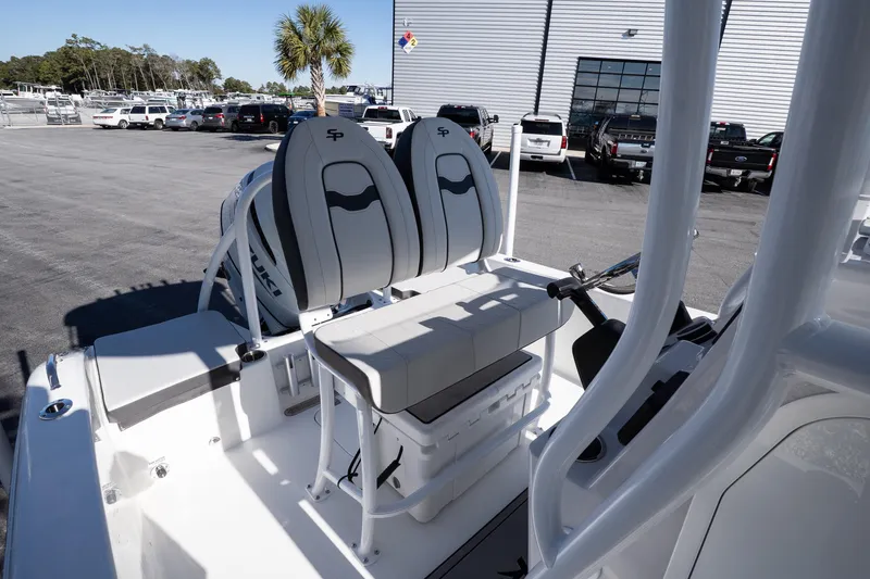 Slide: The Image of 2026 Sea Pro 202 Center Console boat interior with dual seats and steering wheel. - 9