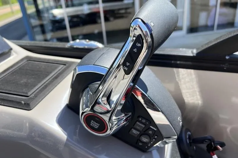 Slide: The Image of 2024 Barletta Corsa 23U throttle control with start/stop button and directional indicators. - 15