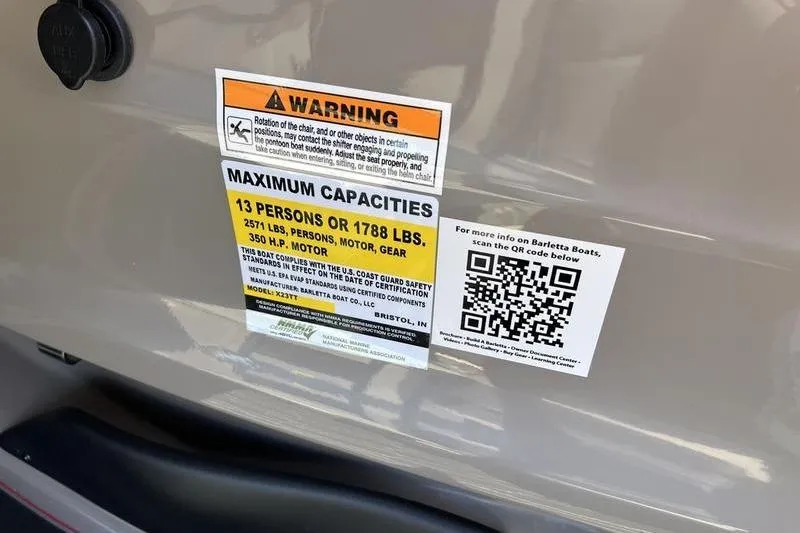 Slide: The Image of 2024 Barletta Corsa 23U capacity label, warning, and QR code for more information. - 17