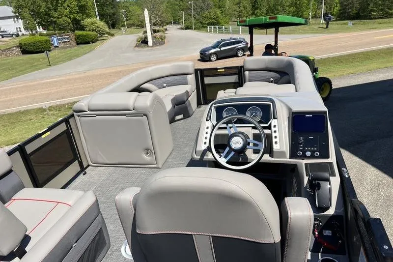 Slide: The Image of 2024 Barletta Corsa 23U pontoon boat interior with modern helm and seating. - 21