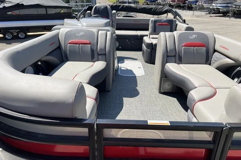 Slide: The Image of 2024 Barletta Corsa 23U pontoon boat interior with luxurious seating and modern design. - 6