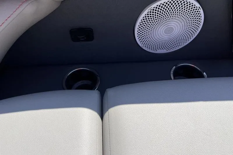 Slide: The Image of 2024 Barletta Corsa 23U interior with speaker and cup holders. - 8