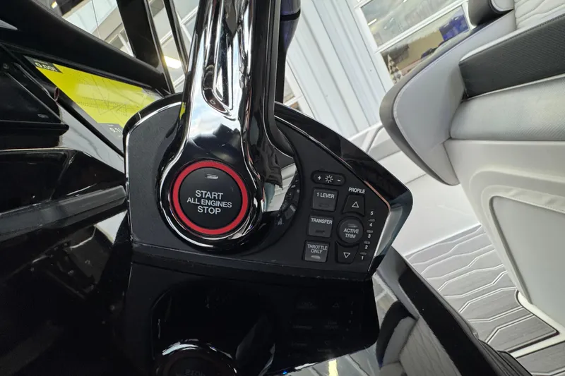 Slide: The Image of Control panel of 2023 Sunsation 32CCX boat with start/stop button and various controls. - 13