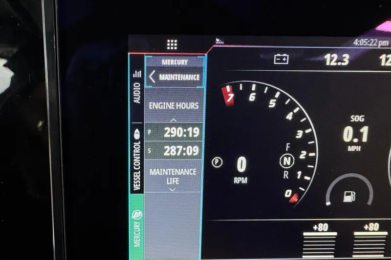 Slide: The Image of Dashboard of 2023 Sunsation 32CCX showing engine hours and speedometer. - 22