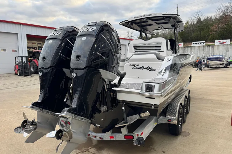 Slide: The Image of 2023 Sunsation 32CCX boat with dual outboard engines on a trailer. - 3