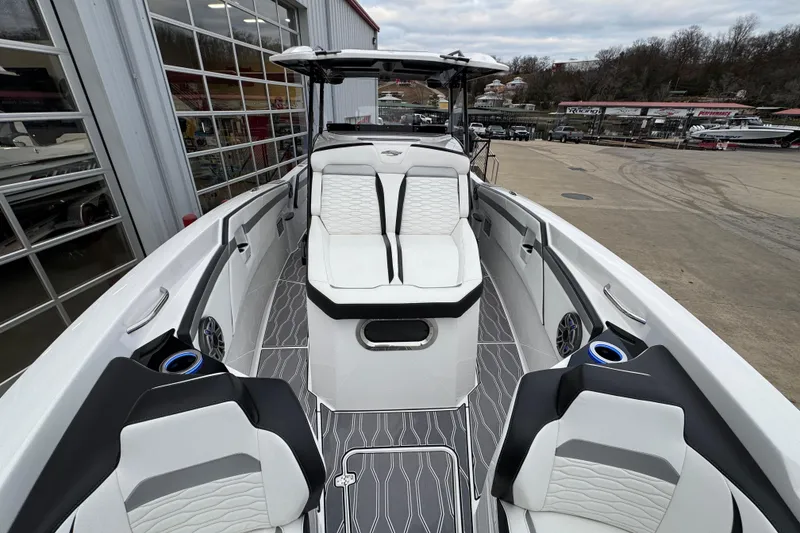 Slide: The Image of 2023 Sunsation 32CCX boat interior with modern seating and sleek design. - 8