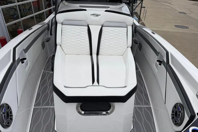Slide: The Image of 2023 Sunsation 32CCX boat interior with white seating and modern design. - 9