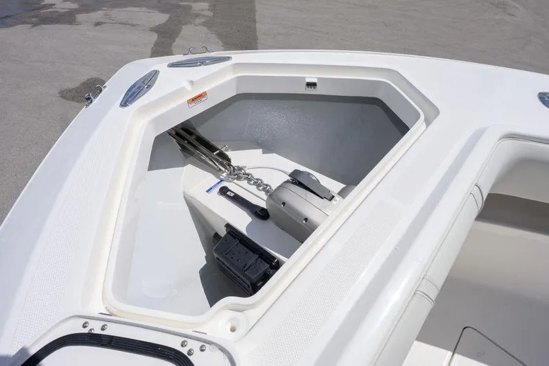 Slide: The Image of 2025 SeaVee 320B boat anchor compartment with chain and winch system. - 13