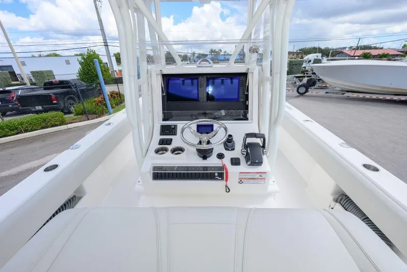 Slide: The Image of 2025 SeaVee 320B boat console with modern navigation and control systems. - 8