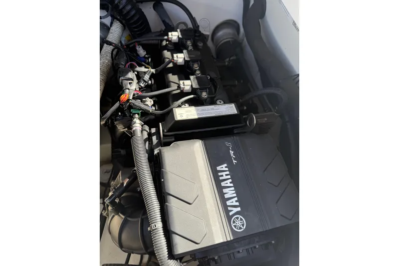 Slide: The Image of Engine compartment of 2018 Yamaha Boats 210 FSH Sport, showcasing Yamaha TR-1 engine. - 15