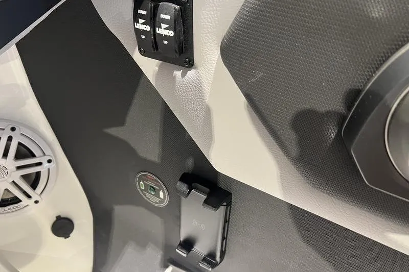 Slide: The Image of 2025 Cobalt CS23 Surf boat interior controls and speaker detail. - 35