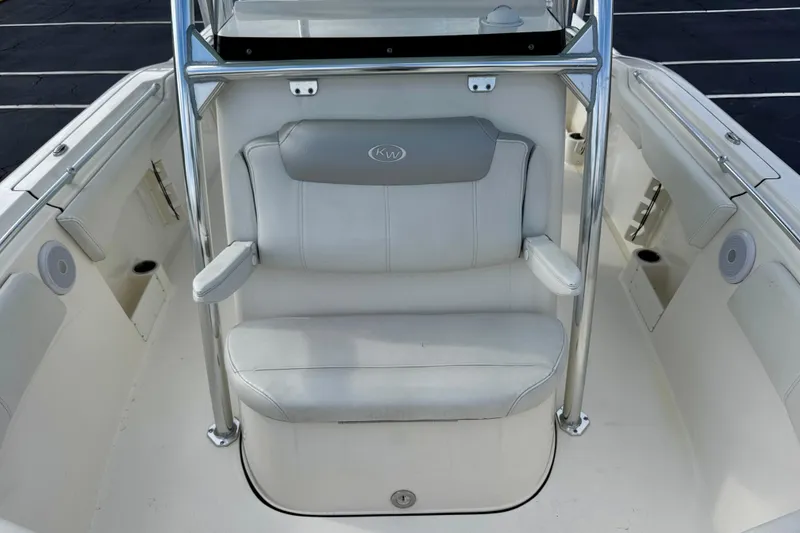 Slide: The Image of 2023 Key West 263 FS boat interior with white seating and stainless steel frame. - 19
