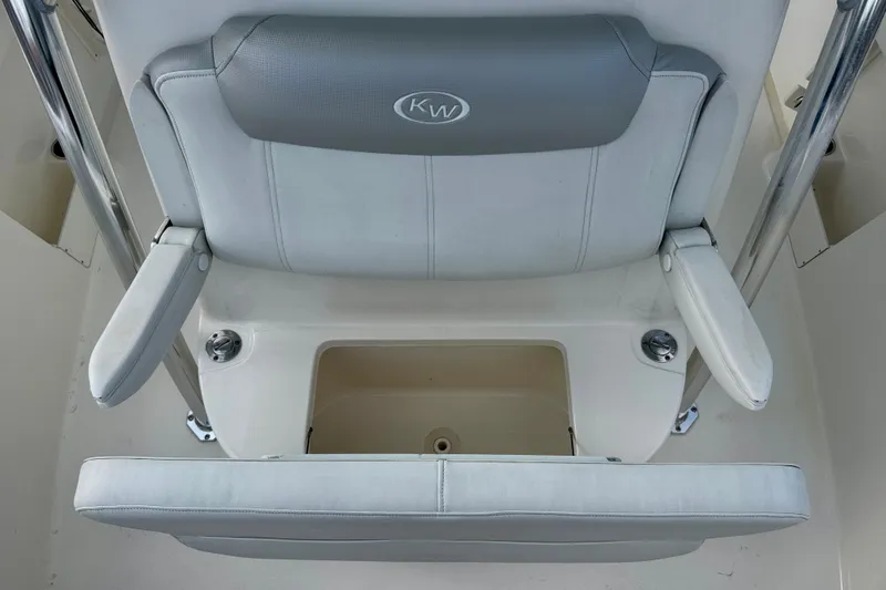 Slide: The Image of 2023 Key West 263 FS boat seat with storage compartment and armrests. - 20