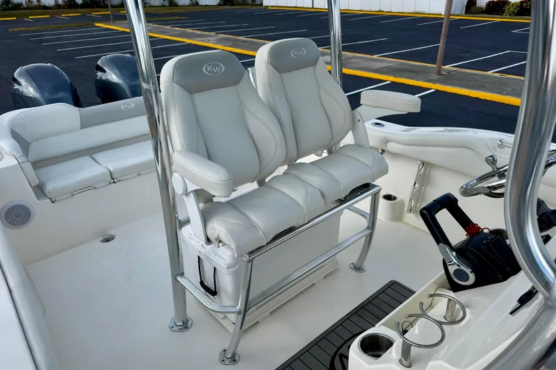 Slide: The Image of 2023 Key West 263 FS boat seats, featuring luxurious white upholstery and ergonomic design. - 23