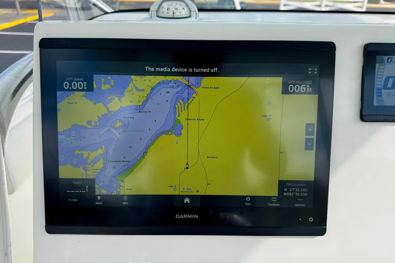Slide: The Image of Garmin navigation display on 2023 Key West 263 FS boat, showing map and GPS data. - 27