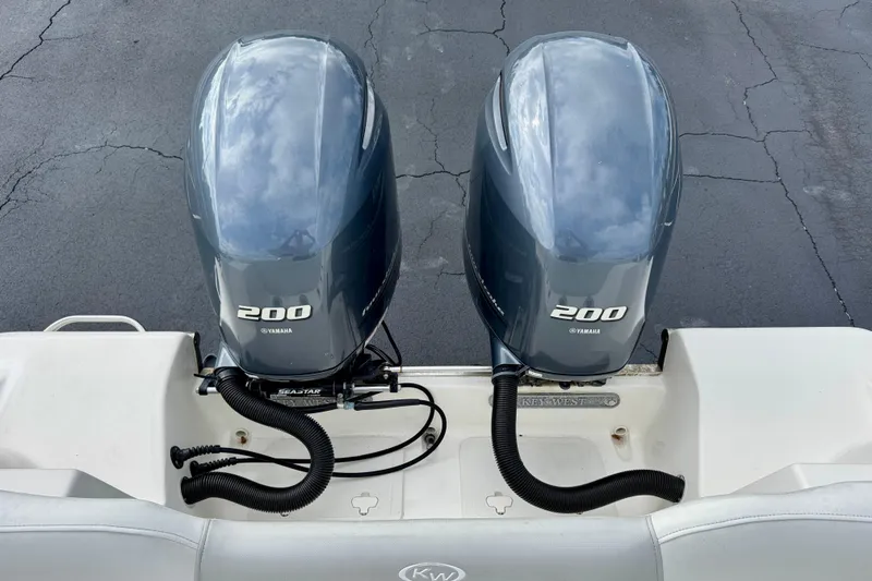 Slide: The Image of 2023 Key West 263 FS boat with dual Yamaha 200 outboard engines. - 42