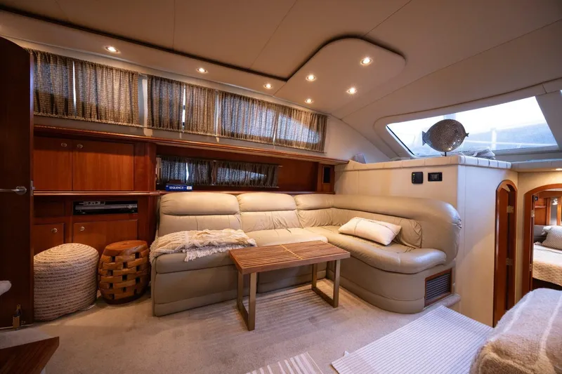 Slide: The Image of Luxurious interior of 2005 Cruisers Yachts 455 Express Motoryacht with plush seating and elegant decor. - 10