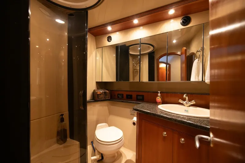 Slide: The Image of Luxurious bathroom in 2005 Cruisers Yachts 455 Express Motoryacht with modern fixtures. - 20