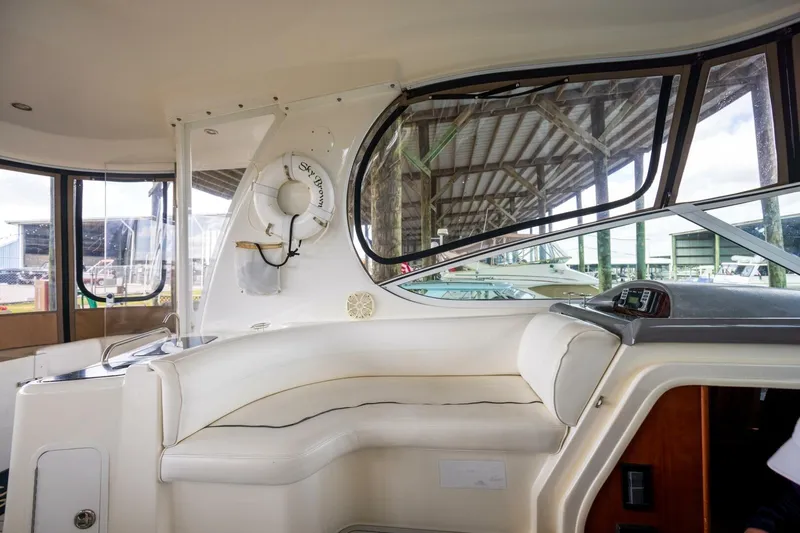 Slide: The Image of Interior of 2005 Cruisers Yachts 455 Express Motoryacht with seating and life preserver. - 33