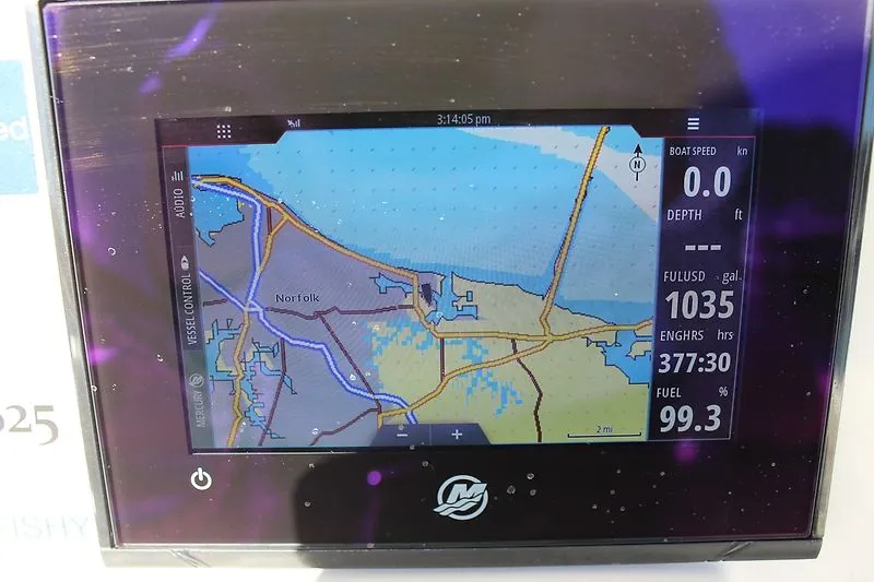 Slide: The Image of Navigation display on Sailfish 232CC boat, showing map near Norfolk, fuel usage, and engine hours. - 8