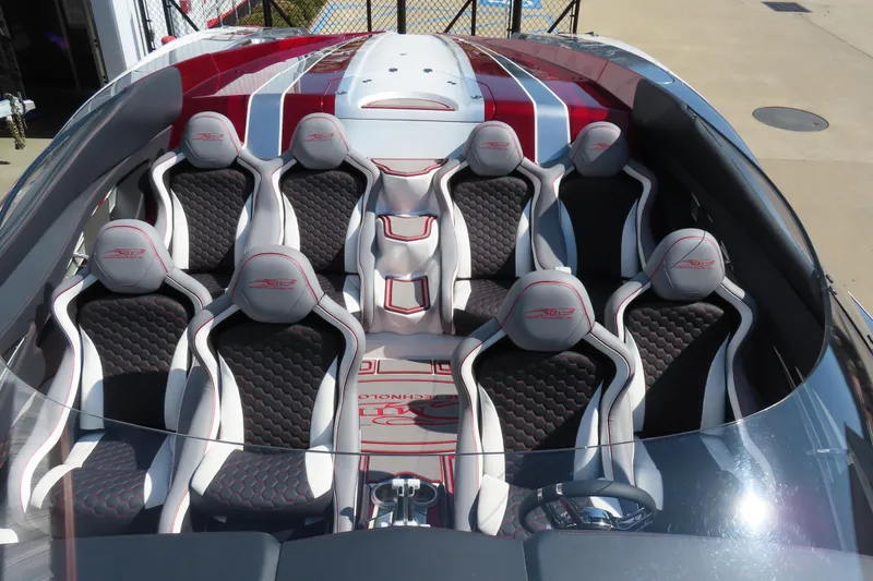 Slide: The Image of 2016 MTI 48 boat interior with luxury seating and sleek design. - 32