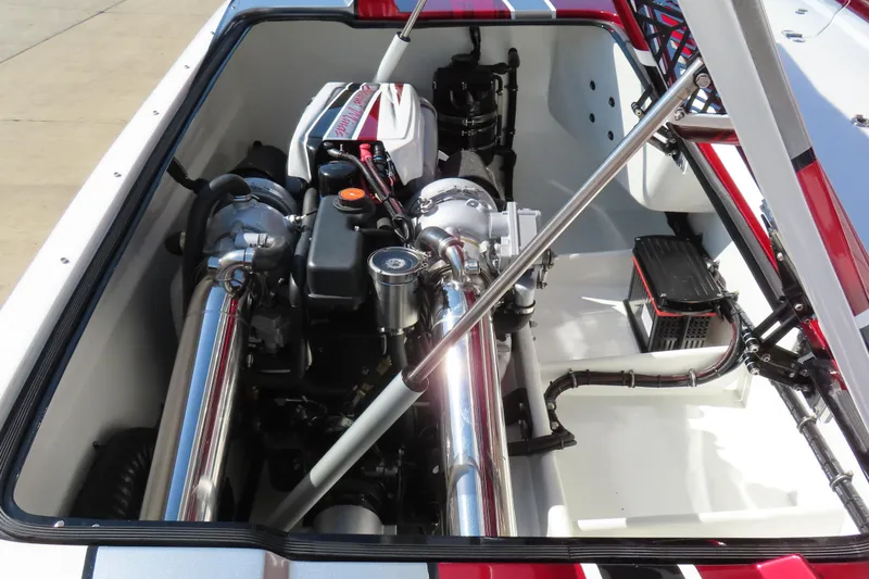 Slide: The Image of 2016 MTI 48 boat engine compartment with polished components and detailed machinery. - 39