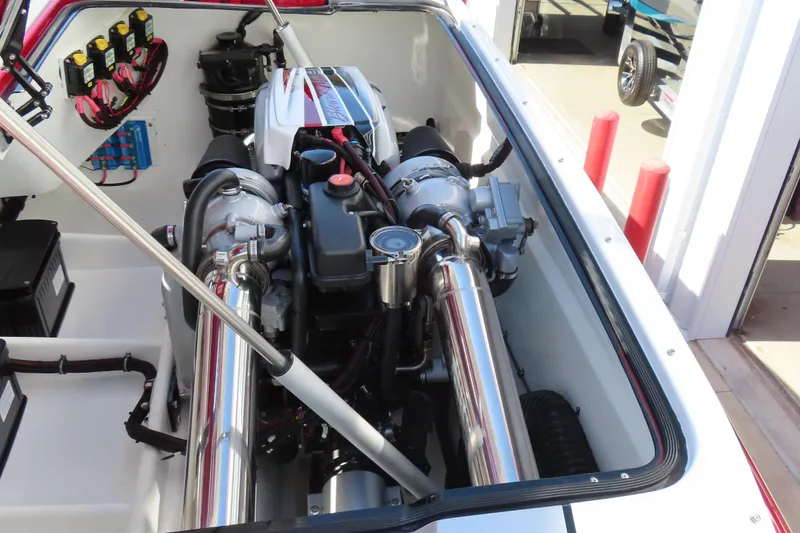 Slide: The Image of Engine compartment of a 2016 MTI 48 boat with visible components and wiring. - 40