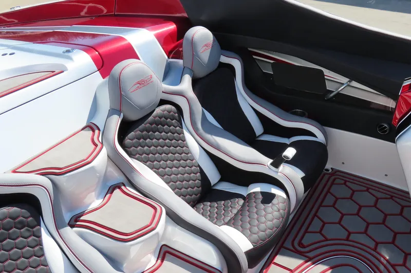Slide: The Image of Luxurious interior of 2016 MTI 48 boat with stylish red and black seating. - 44