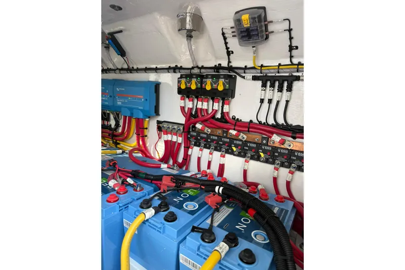 Slide: The Image of Interior cabin of 2026 Mag Bay 43 CC boat with bed and kitchenette. - 40