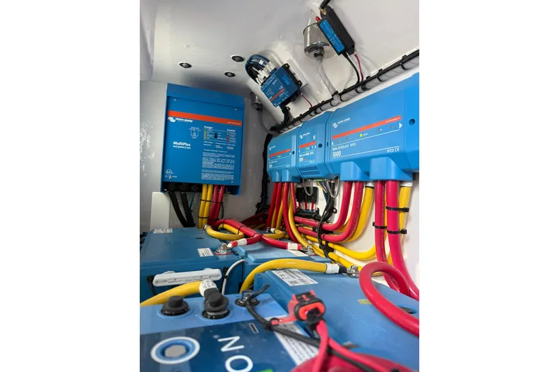 Slide: The Image of 2026 Mag Bay 43 CC cabin interior with cozy bed and modern lighting. - 42