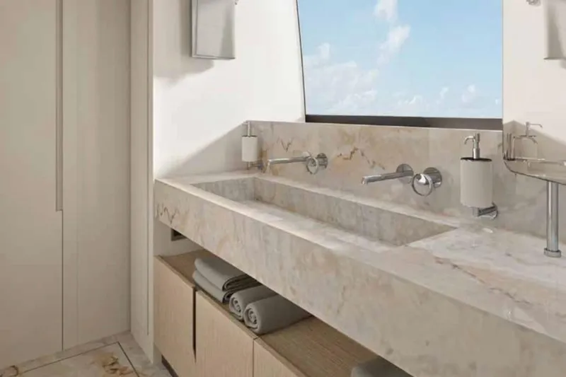 Slide: The Image of Luxurious bathroom interior of 2026 Sanlorenzo SX100 yacht with marble sink and ocean view. - 10