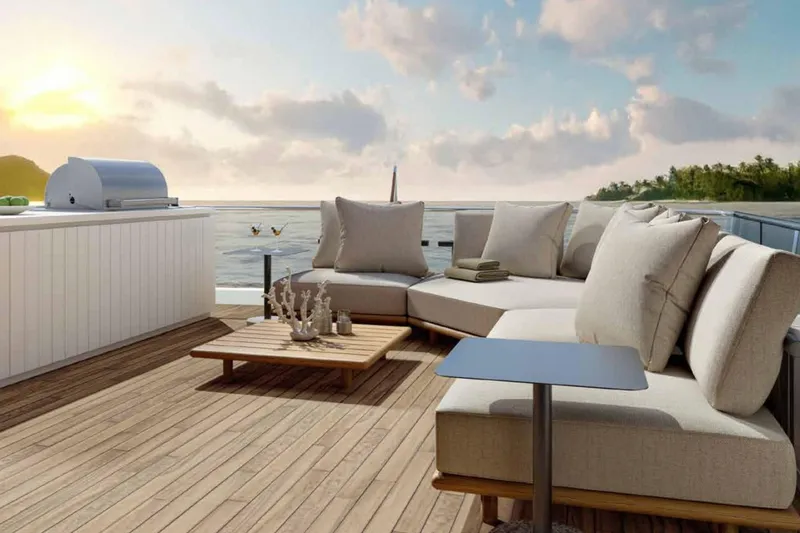 Slide: The Image of Luxurious Sanlorenzo SX100 yacht deck with elegant seating, ocean view, and sunset ambiance, 2026 model. - 19