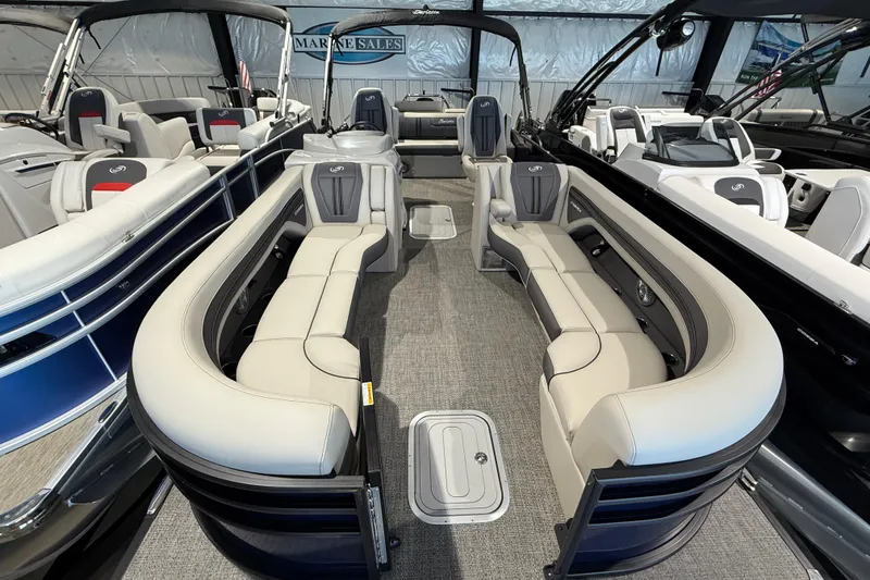 Slide: The Image of 2025 Barletta CORSA 25UC pontoon boat interior with luxurious seating and modern design. - 3