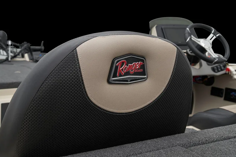 Slide: The Image of Manufacturer Provided Image: 2026 Ranger Z185 boat seat with logo, steering wheel in background. - 47