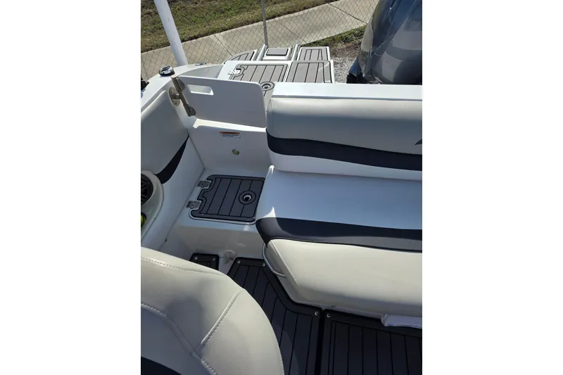 Slide: The Image of 2022 Starcraft MDX 191 E O/B boat interior with seating and deck details. - 11