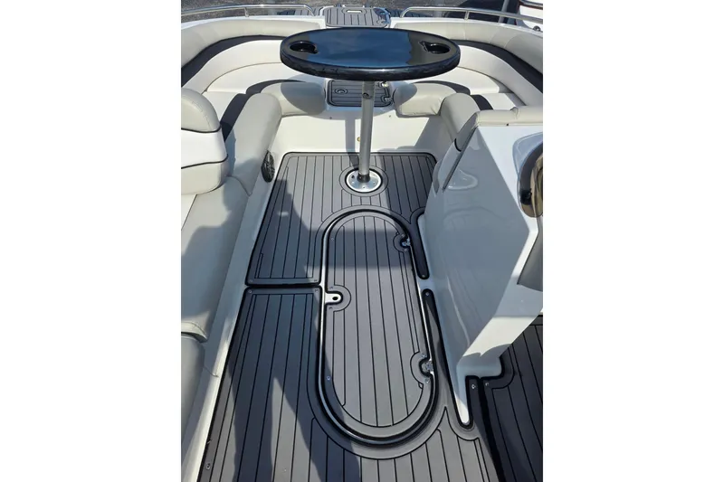 Slide: The Image of 2022 Starcraft MDX 191 E O/B boat interior with sleek seating and modern flooring. - 14
