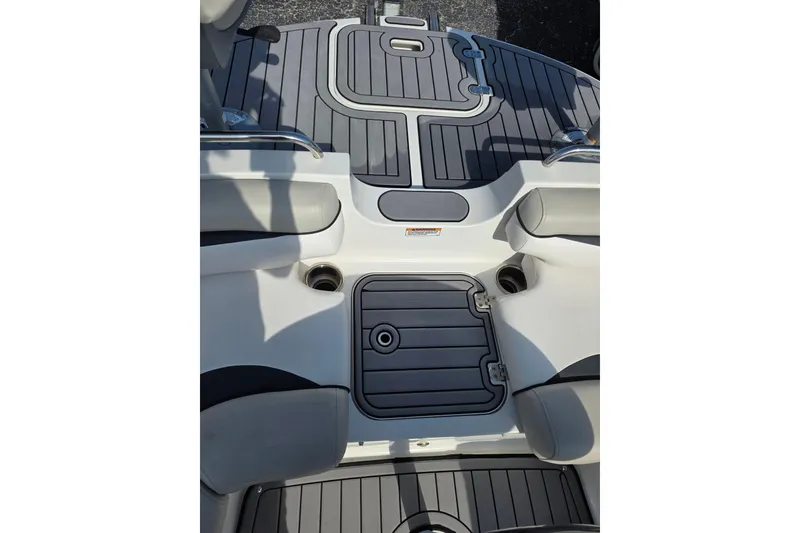 Slide: The Image of 2022 Starcraft MDX 191 E O/B boat interior with gray decking and seating. - 16