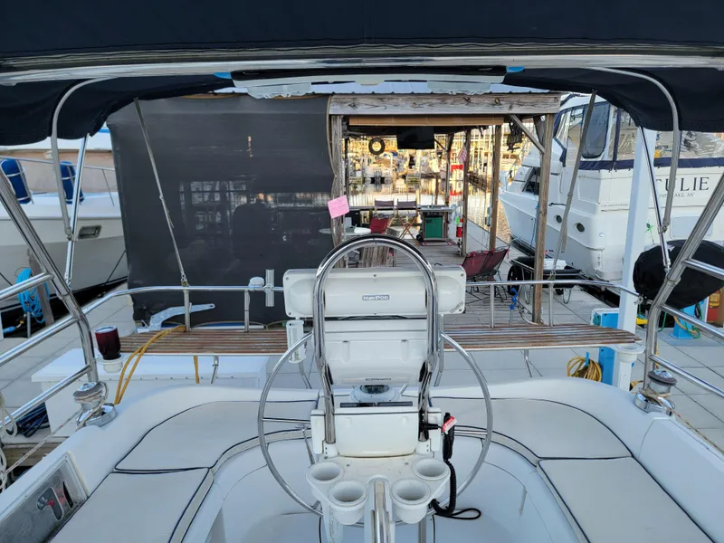 Slide: The Image of Cockpit view of 2004 Hunter 41 AC sailboat docked at marina. - 21
