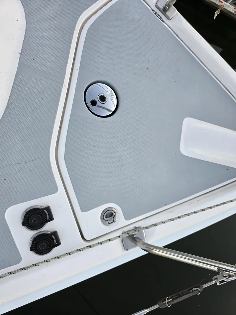 Slide: The Image of Deck of 2004 Hunter 41 AC sailboat with fittings and hardware. - 47