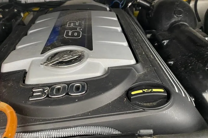 Slide: The Image of Engine of 2018 Rinker EX 320 boat, featuring 6.2L 300 horsepower. - 32